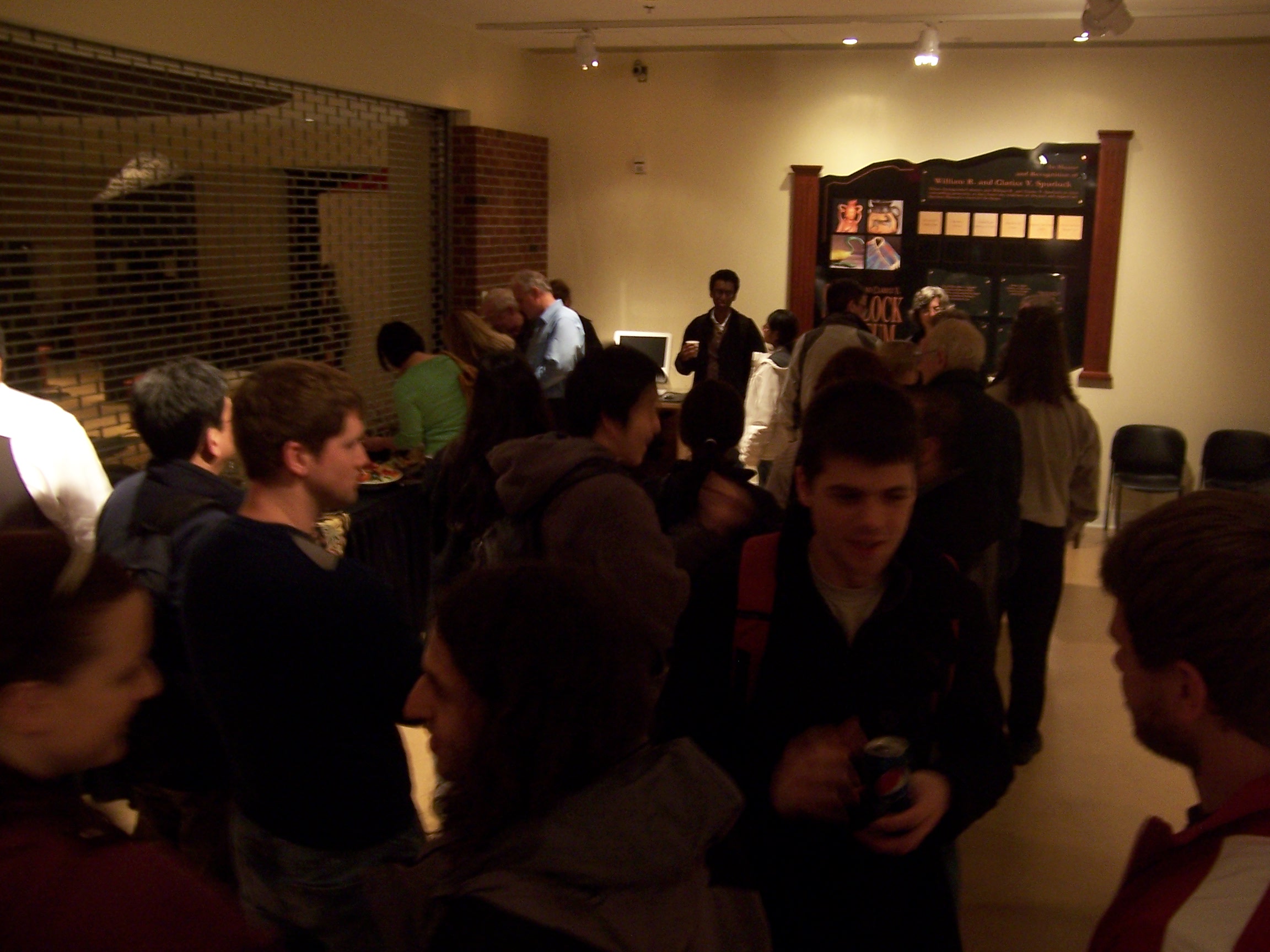 (3) Students and others at the reception following the 2009 Thulin Lecture, including Jay Geyer and Ryan Alexander.