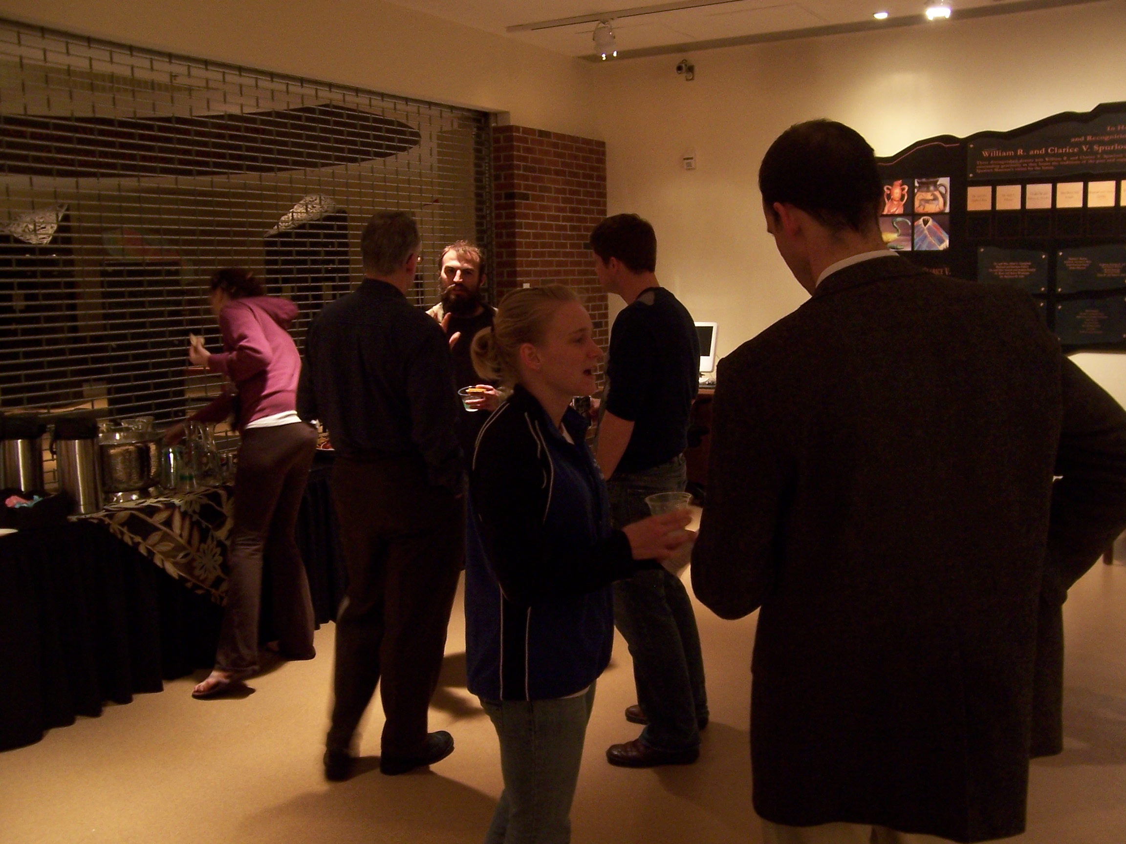 (4) Students and others at the reception, including (facing the camera) Craig Kreutzer and Maggie Dunleavy.